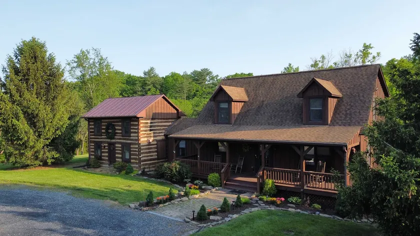 The Royal Cabin | Private Getaway w/ Hot Tub, Game Room, Historic Log Cabin - Image 1