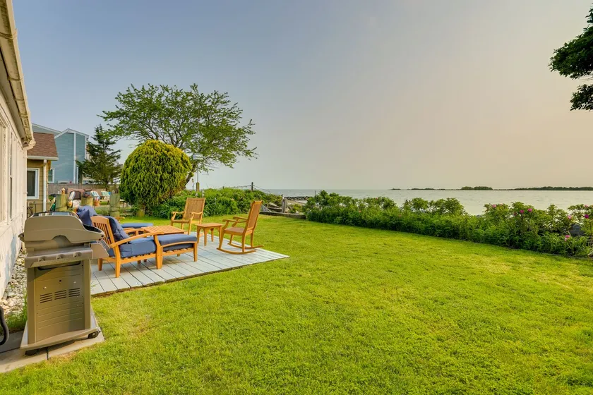 Waterfront Cottage w/ Sunroom + Patio & Grill - Image 1