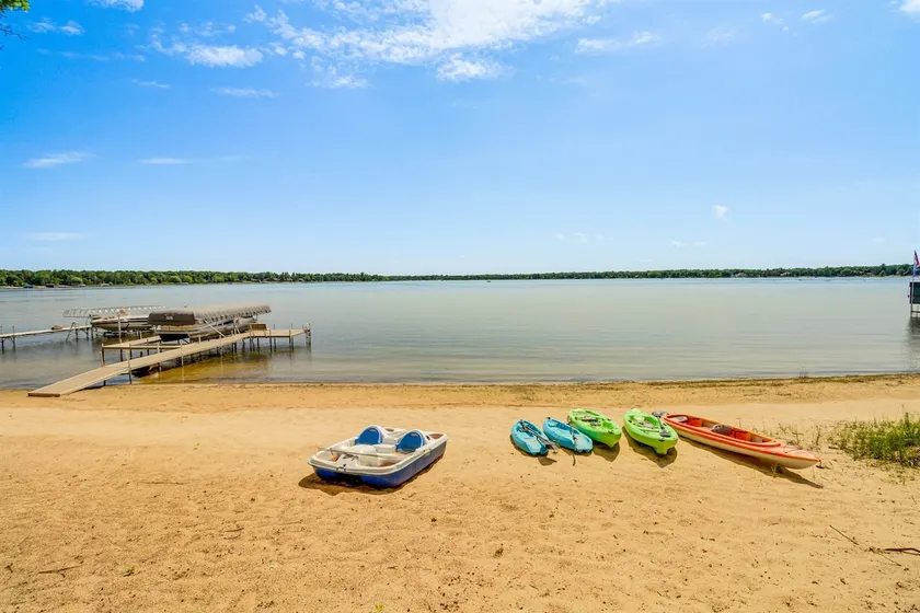 Private Sandy Beach on White Sand Lake | Sleeps 14 - Image 1
