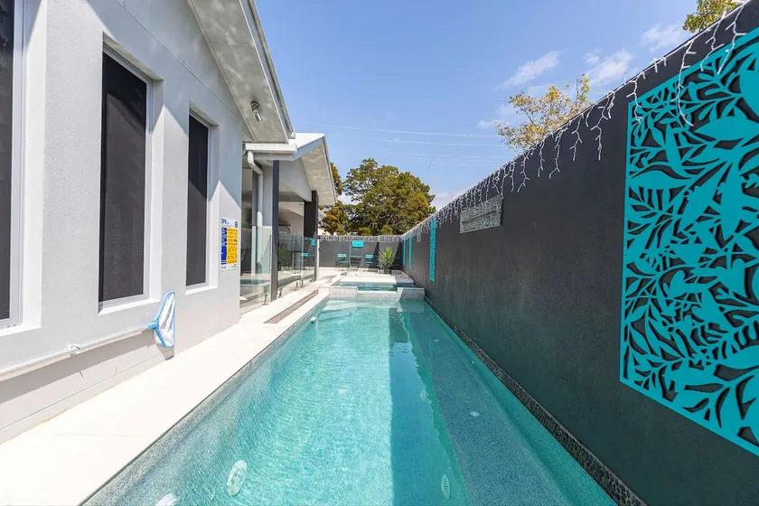 Bribie Breeze Family Retreat with Pool & BBQ - Image 1