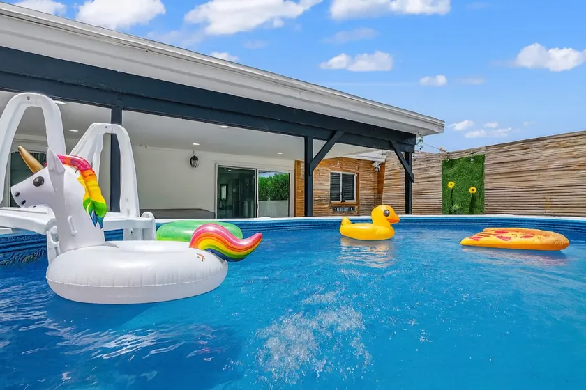 Pool & Canal-View Townhouse | Miami Oasis + BBQ - Image 1