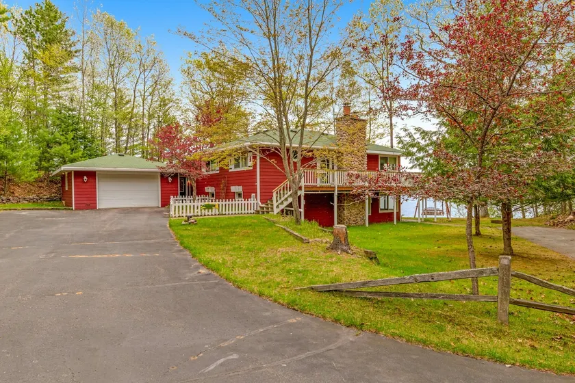 Modern Lakeside Gem with Dual Fireplaces & AC - Image 1