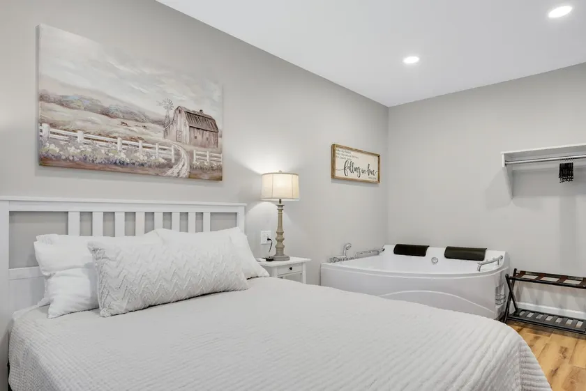 Romantic Getaway with Private Patio and Hot Tub on Main Street - Magnolia Suite - Image 1