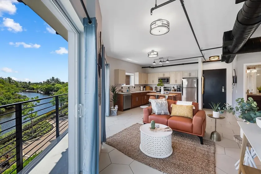 Suite 303: King Bed, Balcony, Heated Pool, Gym - Image 1