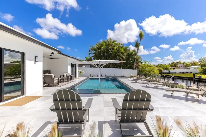 Tranquil, Waterfront Pool + Spa Home - Image 1