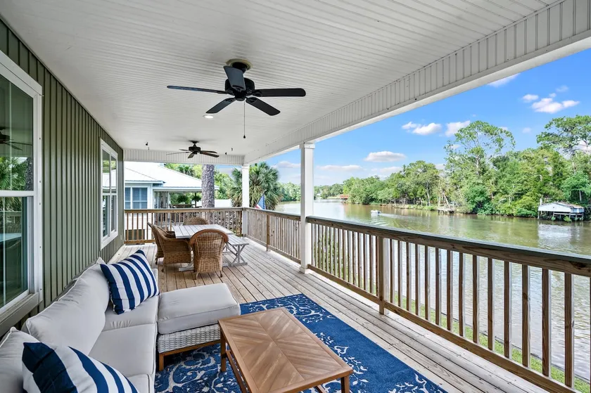 Rest & Reel in Fairhope - Water & Wood Properties - Image 1