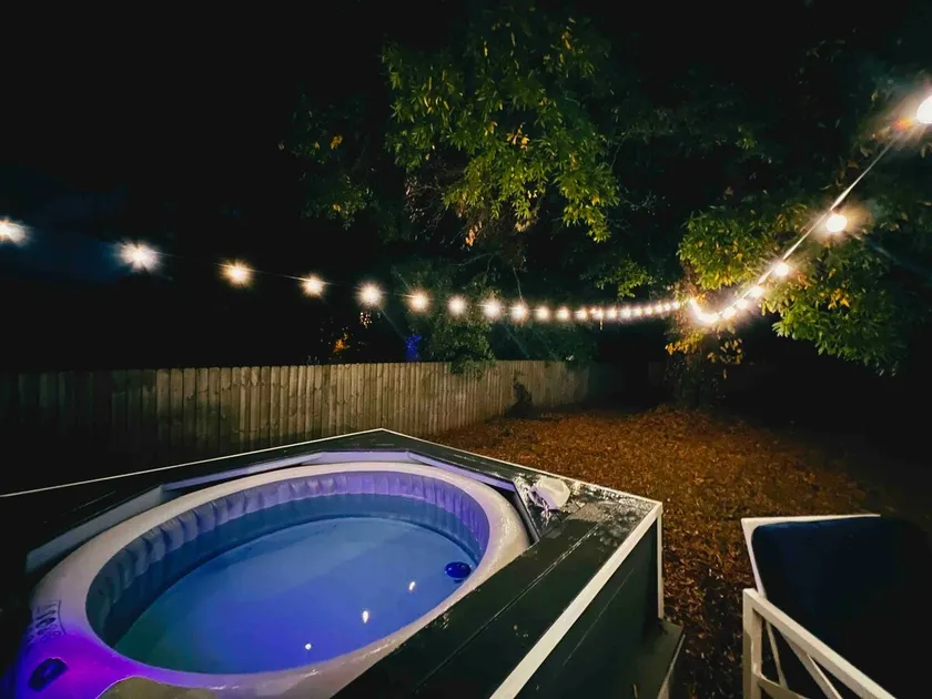 Modern Uptown Stay | King Suite + Hot Tub Bliss - Image 1