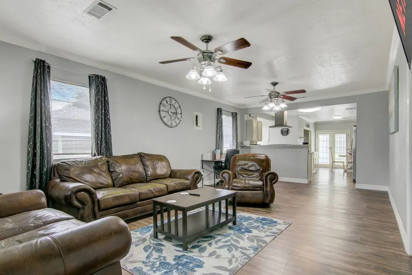Spacious 3 bedroom home with fenced yard - Image 1