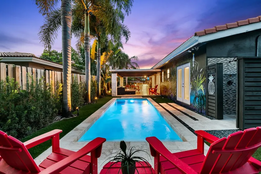 Welcome to Happy Daze – A Bright, Tropical Retreat with a Private Pool Near It All! - Image 1