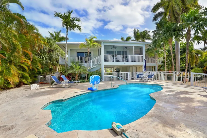 Waterfront Luxury Home with Pool and Boat Dock - Image 1