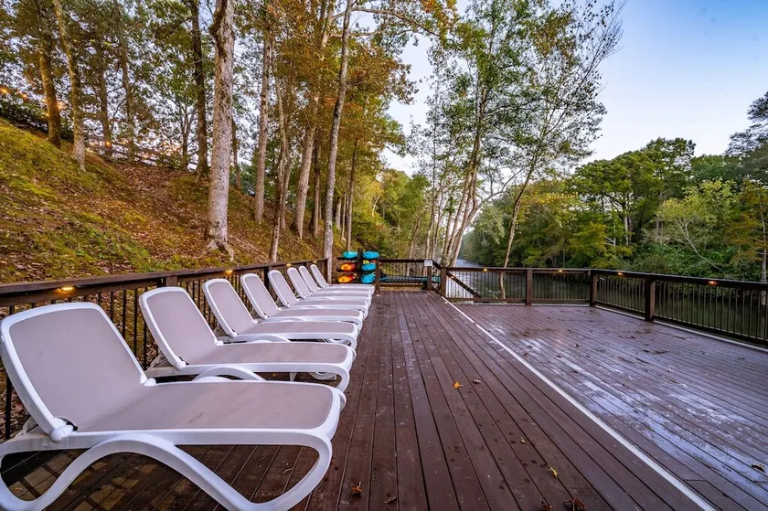 Worth the Wait ~ Riverfront cabin with hot tub, game room, play set and views! - Image 1