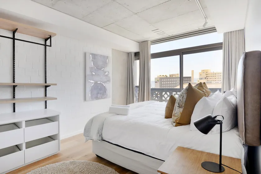 Stylish 2BR Retreat - Beach, Pool & WiFi Access - Image 1