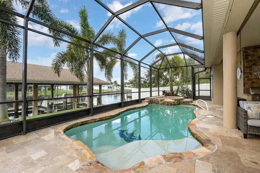 Beautiful waterfront 5 BR home with pool, kayaks - Image 1