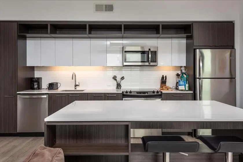 Comfort-Focused 2BR at RTC | Gym + Kitchen - Image 1