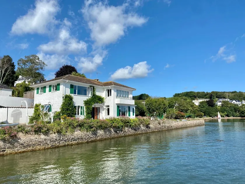 Pier House - Stunning Waterfront Home with Pool - Image 1