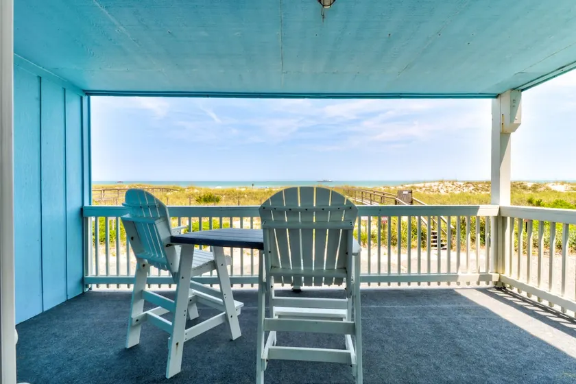 Winds III B1: Cozy condo de 2 chambres en bord de mer avec une piscine communautaire et passage pour la plage - Image 1