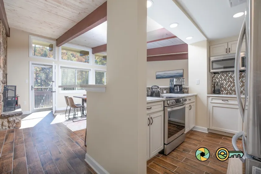 Double the Condo, Double the Fun! | Ski slope side & Mountain views | Vaulted ceilings! - Image 1