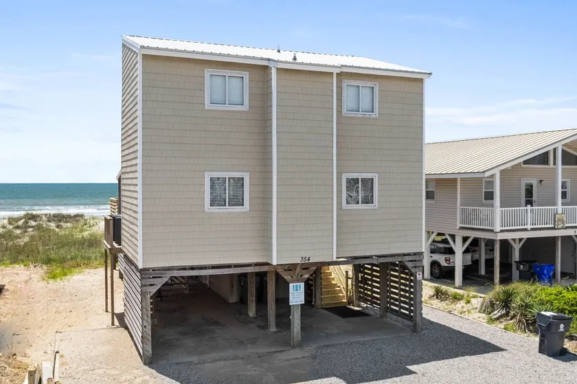 Cheek to Cheek by Brunswick Vacation Rentals: OIB Oceanfront w/ Views & New Deck - Image 1
