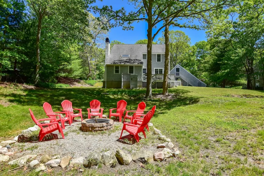 Spacious Stone Fire Pit Game Room - Image 1