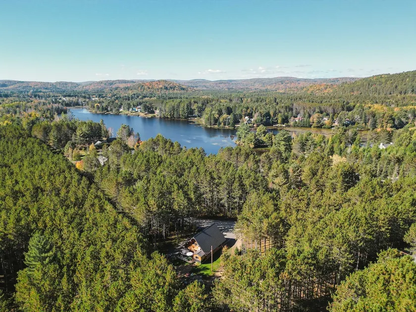 Round wood, spa, lake, volleyball, and more - Image 1