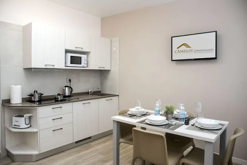 Camelot Apartments - Merlino - Image 1