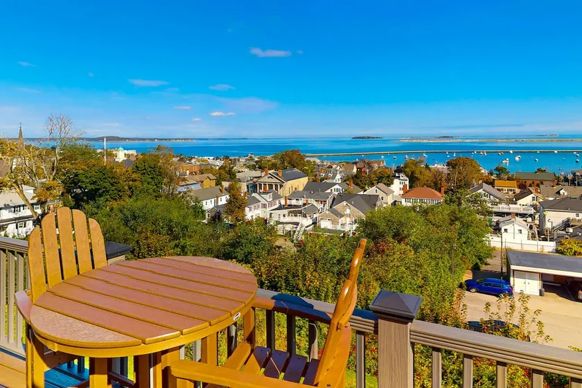 Historic Waterfront Gem with Balcony Views - Image 1