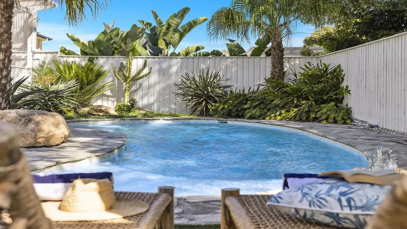 Sojourn - Pool Oasis, Designer Home, opp Beach - Image 1