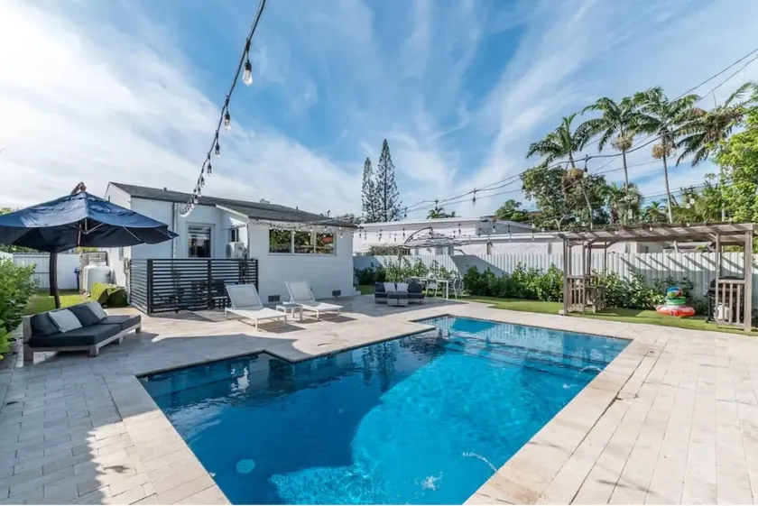 Spacious 4BR 2BA Home with Heated Pool and BBQ - Image 1