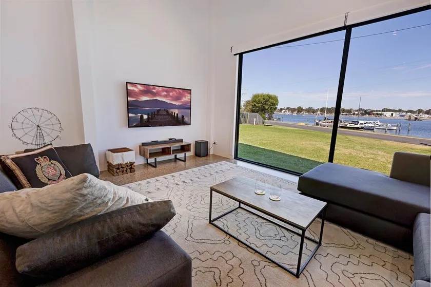 Sunset House - Sun-soaked 4BR Waterfront Retreat - Image 1