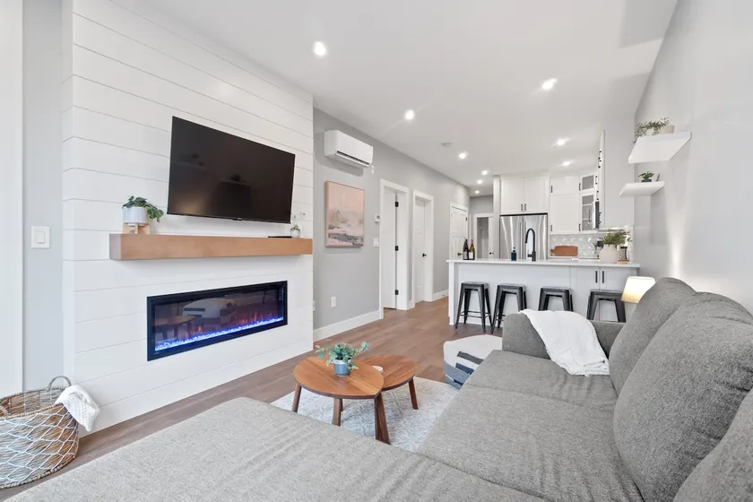 Oasis - Brand New Harrison 1BR + Den! - Image 1