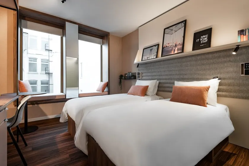 Stylish Twin Room | Your Comfortable Getaway - Image 1