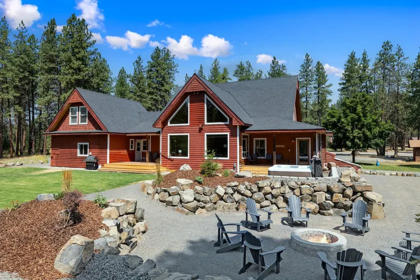 10-acre forest retreat with hot tub and fire pit - Image 1