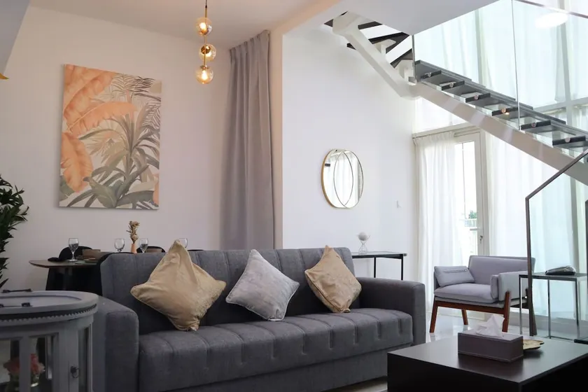 2BR Duplex Haven | Sleek Modern Chic Escape - Image 1