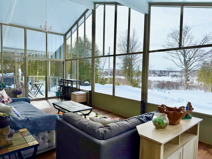 Hillside Haven Retreat: Sunroom & Pond Escape - Image 1