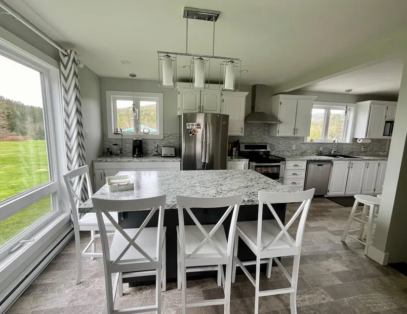 House in Thorn Tree Ocean View Fire Table - Image 1