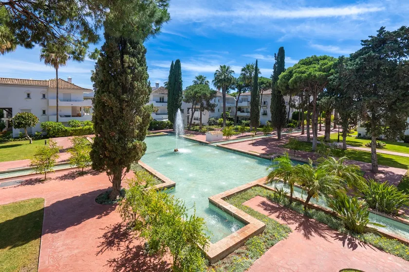 Chic 2BR with Sunlit Terrace | 5-Pools | Garage - Image 1