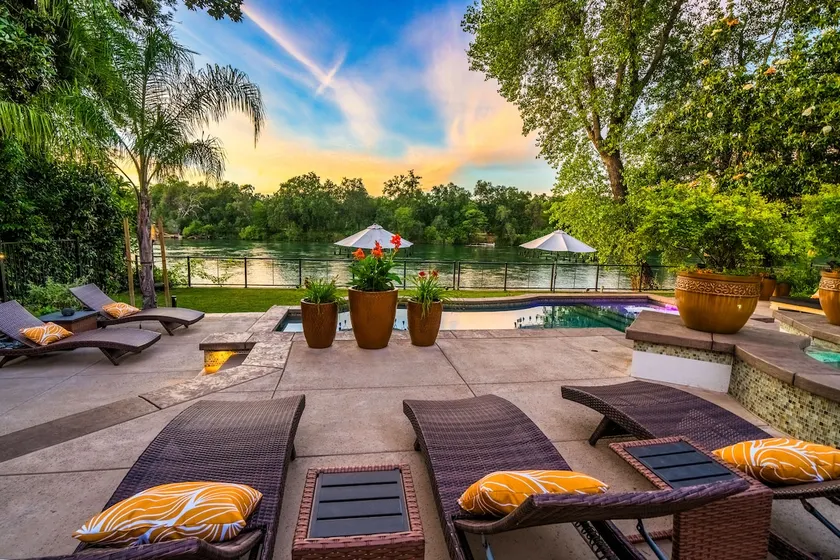 Riverfront Retreat - Pool and Hot Tub Escape - Image 1