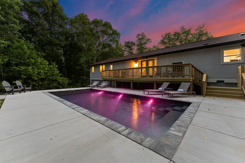 Sleeps 18 • Lakefront Retreat • Pool, Private Dock - Image 1