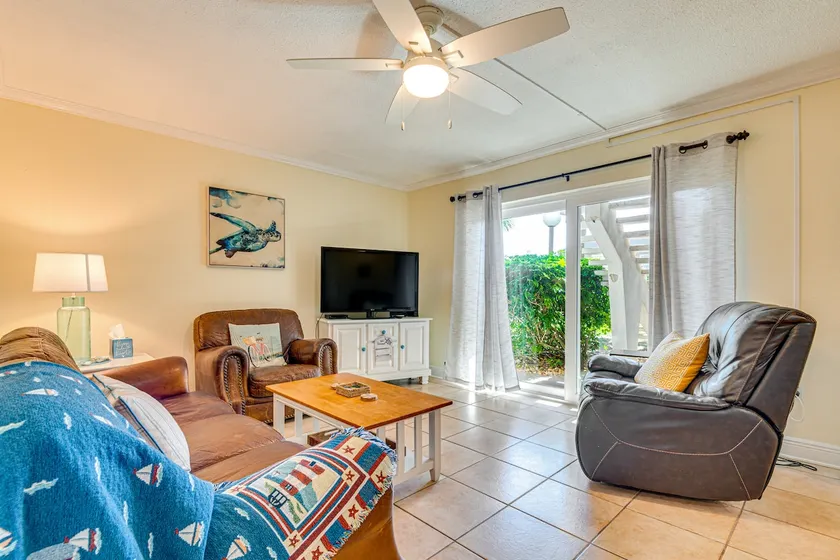 Just Cocoa Beachy - Cozy beachside condo with pool and beach access - Image 1