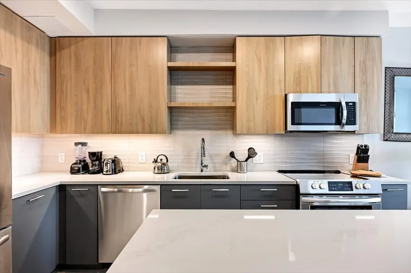 Upscale Reston Suite • Kitchen & Laundry - Image 1