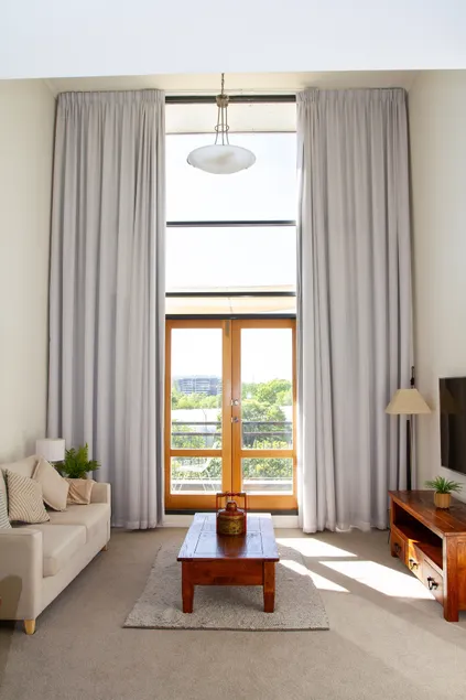 Loft-Style CBD 1-Bed with Rooftop Terrace  BBQ - Image 1