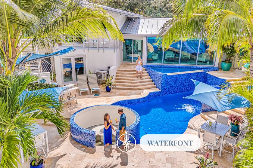 Waterfront Oasis Cascading Pool Views Centrally located Heated Pool Cascade KeyResidences - Image 1