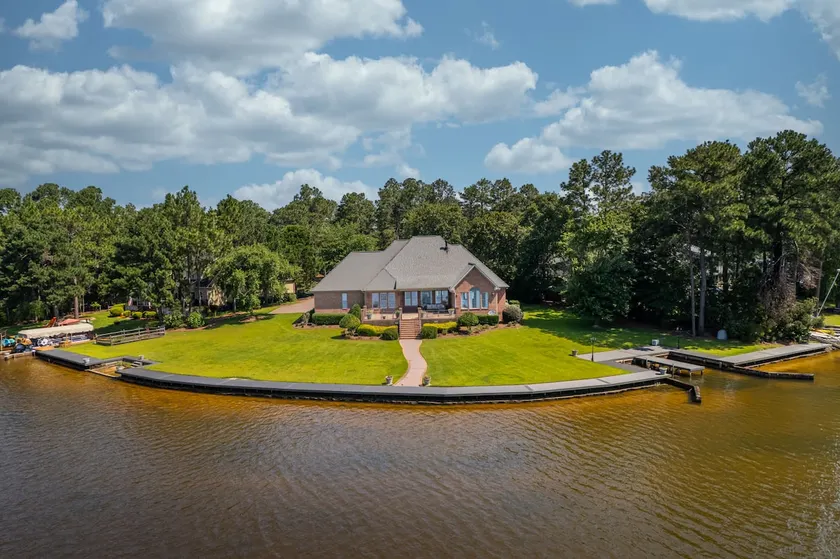 Lakefront Family Retreat with Game Room Fun - Image 1