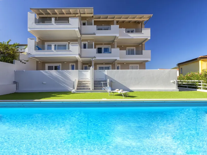 The terrace overlooking the pool by Interhome - Image 1
