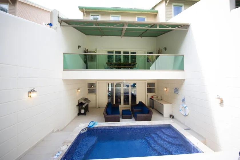 Luxury Loft Style Townhouse + Pool – Walk to Beach - Image 1