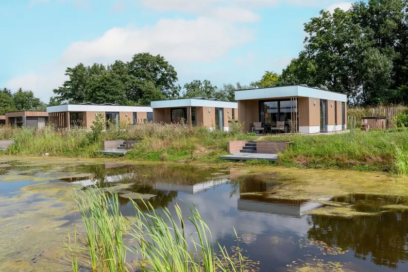Exclusive Waterfront Lodge with Private Hot Tub - Image 1