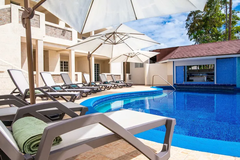 Barbadian Charm: Boutique Stay Steps from Beaches - Image 1