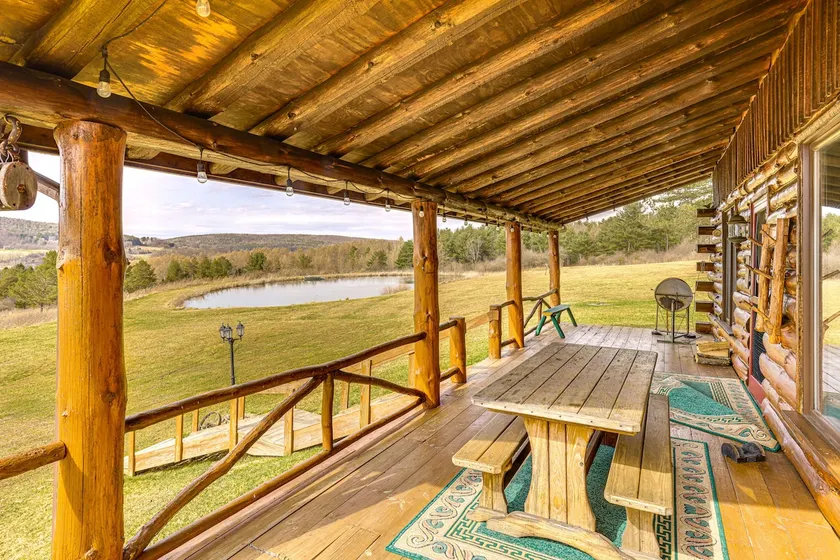 Fish & Hike on 180 Acres! Log Cabin in Almond - Image 1
