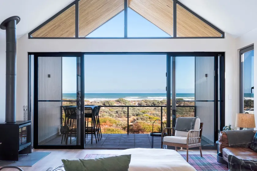 Timbers By The Sea—Beachfront Bliss with Fireplace - Image 1