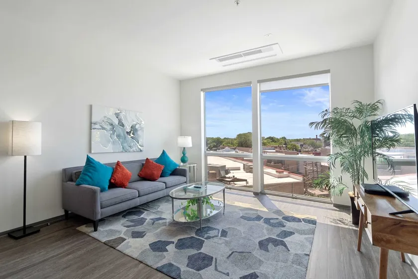 1BR City Loft With Modern Glass Views - Image 1